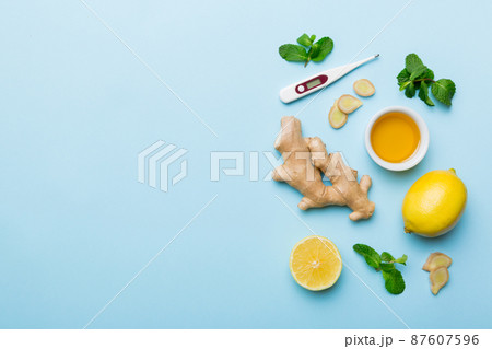 Natural cold and flu home remedies. Natural ingredients for immunity stimulation and viruses protection. top view flat lay Natural cold and flu home remedies. Natural ingredients for immunity stimulation and viruses protection. top view flat lay 87607596