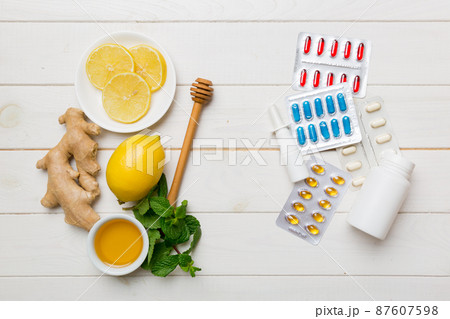 Natural cold and flu home remedies. Natural ingredients for immunity stimulation and viruses protection. top view flat lay Natural cold and flu home remedies. Natural ingredients for immunity stimulation and viruses protection. top view flat lay 87607598
