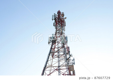 Modern communication tower with equipment. Mobile connection. Modern technologies, 5g. Modern communication tower with equipment. Mobile connection. Modern technologies, 5g. 87607729