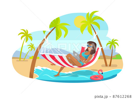 Freelancer Works on Laptop in Hammock at Beach Freelancer Works on Laptop in Hammock at Beach 87612268