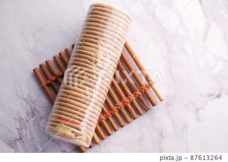 close up of cheese cookies in a packer on table  87613264