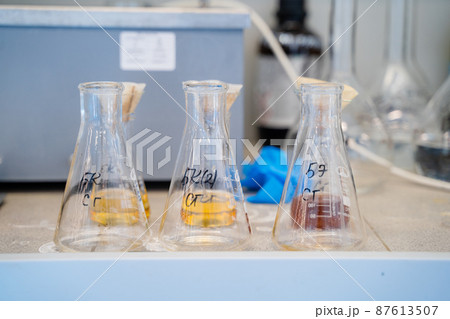 Equipment for the analysis of flasks with chemical elements, light background Equipment for the analysis of flasks with chemical elements, light background 87613507