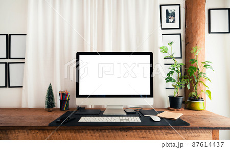 home office desk,Computer screen on a wooden table in the house home office desk,Computer screen on a wooden table in the house 87614437