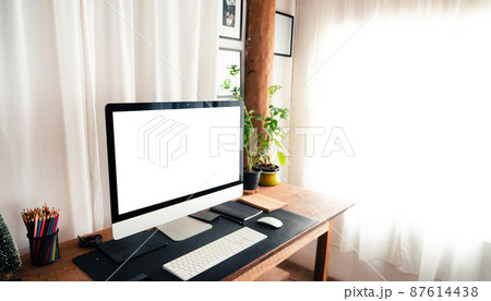 home office desk,Computer screen on a wooden table in the house home office desk,Computer screen on a wooden table in the house 87614438