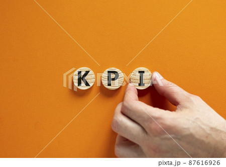 KPI, key performance indicator symbol. Concept word KPI, key performance indicator on wooden circles on beautiful orange background, copy space. Business, KPI, key performance indicator concept. KPI, key performance indicator symbol. Concept word KPI, key performance indicator on wooden circles on beautiful orange background, copy space. Business, KPI, key performance indicator concept. 87616926