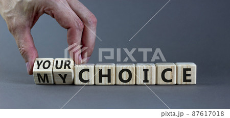 My or your choice symbol. Businessman turns wooden cubes and changes words 'my choice' to 'your choice'. Beautiful grey background, copy space. Business and my or your choice concept. My or your choice symbol. Businessman turns wooden cubes and changes words 'my choice' to 'your choice'. Beautiful grey background, copy space. Business and my or your choice concept. 87617018