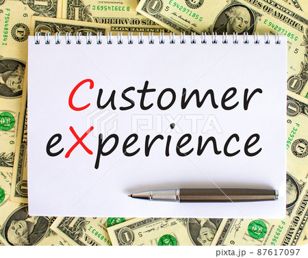 CX customer experience symbol. Concept words CX customer experience on white note. Metallic pen. Dollar bills. Beautiful white background. Copy space. Business and CX customer experience concept. CX customer experience symbol. Concept words CX customer experience on white note. Metallic pen. Dollar bills. Beautiful white background. Copy space. Business and CX customer experience concept. 87617097