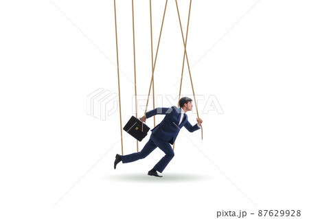 Businessman puppet being manipulated by ropes 87629928