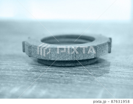 Gray abstract model printed on 3d printer from powder on background. Gray abstract model printed on 3d printer from powder on background. 87631958