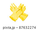 Yellow rubber gloves on a white background. concept of cleaning 87632274