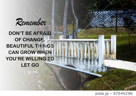 Motivational and Inspirational quote - Don't be afraid of change. Beautiful things can grow when you're willing to let go. With blurred bridge background. Motivational concept 87640296