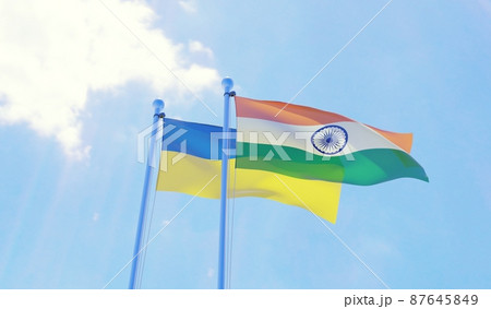 India and Ukraine, two flags waving against blue sky. 3d image 87645849