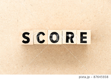 Alphabet letter block in word score on wood background 87645938