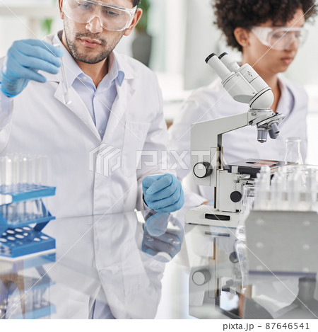 scientist testing samples in a laboratory. close-up. 87646541
