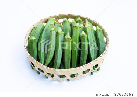 Fresh okra on white background. Fresh okra on white background. 87653668