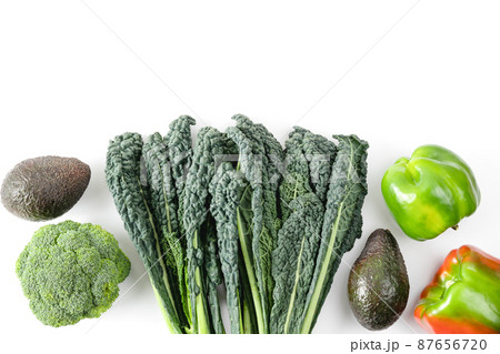 Raw healthy food clean eating vegetables source of protein for vegetarians: broccoli, bellpepper, kale, tomato, avocado. Fresh colorful organic vegetables captured from above, top view Raw healthy food clean eating vegetables source of protein for vegetarians: broccoli, bellpepper, kale, tomato, avocado. Fresh colorful organic vegetables captured from above, top view 87656720