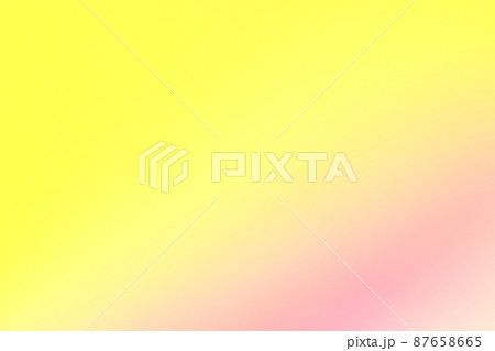 パステルカラーの背景 ピンク色と黄色のグラデーションの写真素材