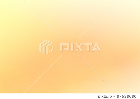 パステルカラーの背景 黄色・オレンジ色のグラデーションの写真素材