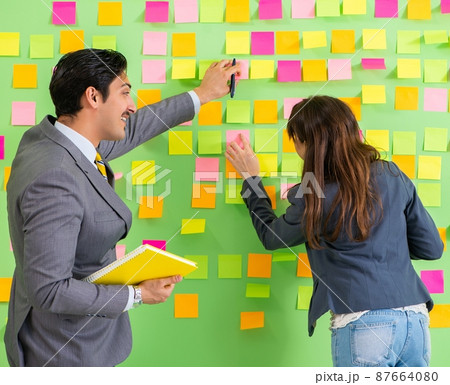 Business colleagues discussing future priorities 87664080