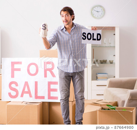 Young man offering home for sale and moving out Young man offering home for sale and moving out 87664980