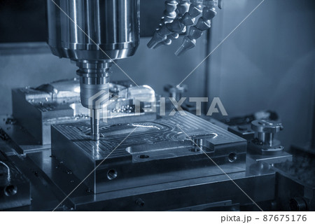 The CNC milling machine rough cutting the injection mold parts by indexable  endmill tools. 87675176