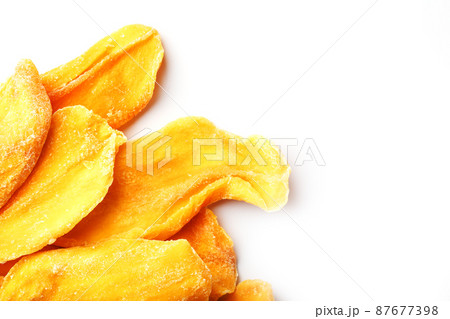 Dried fruit slices from organic ripe mango Dried fruit slices from organic ripe mango 87677398