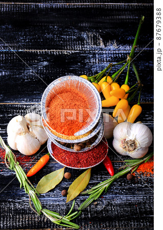set spice pepper garlic bay leaf barberry turmeric dark wood background retro style set spice pepper garlic bay leaf barberry turmeric dark wood background retro style 87679388