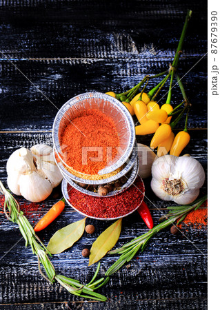 set spice pepper garlic bay leaf barberry turmeric dark wood background retro style set spice pepper garlic bay leaf barberry turmeric dark wood background retro style 87679390