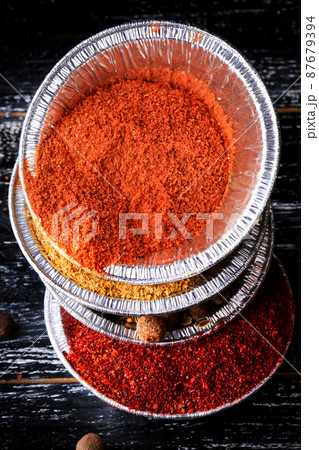 pepper set spice turmeric barberry dark wood background retro style pepper set spice turmeric barberry dark wood background retro style 87679394