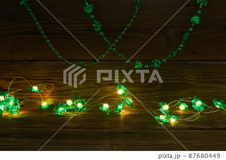 St. Patrick's Day abstract background decorated with shamrock leaves. Patrick Day pub party celebrating. 87680449