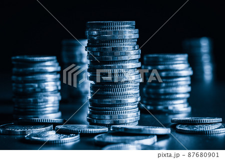 Pile of gold coins money stack in finance treasury deposit bank account saving 87680901