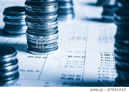 Pile of gold coins money stack in finance treasury deposit bank account saving 87681010