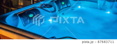 Hot tub hydromassage pool. Illuminated pool. Rest outside the city. Cottage with hydromassage pool BANNER, LONG FORMAT 87683711