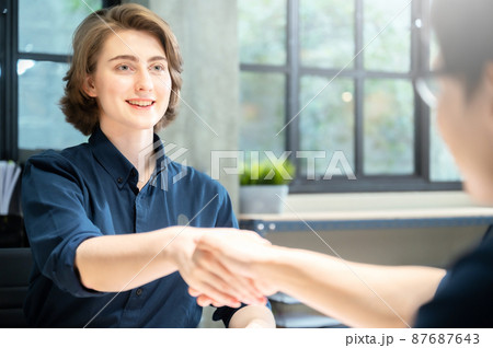 Business people shaking hands. Negotiating and accept deal. Collaborative teamwork partnership 87687643