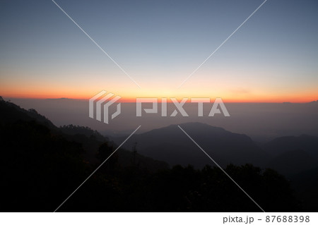 Beautiful view of mountains and white mist Beautiful view of mountains and white mist 87688398