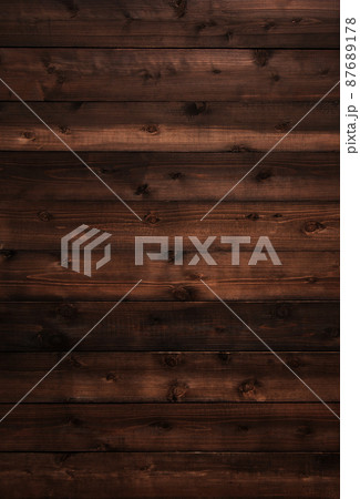 木目や節のある黒褐色の板が並ぶ縦長の背景画像 木目や節のある黒褐色の板が並ぶ縦長の背景画像 87689178