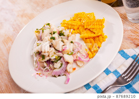 Ceviche of trout served with onion, parsley and corn 87689210