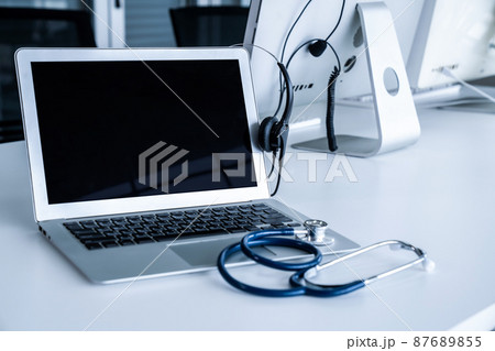 Headset and doctor equipment at clinic ready for actively support for patient 87689855