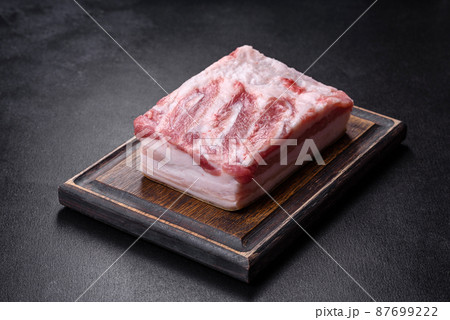 Close-up fat Salted lard homemade lard on a wooden board Close-up fat Salted lard homemade lard on a wooden board 87699222