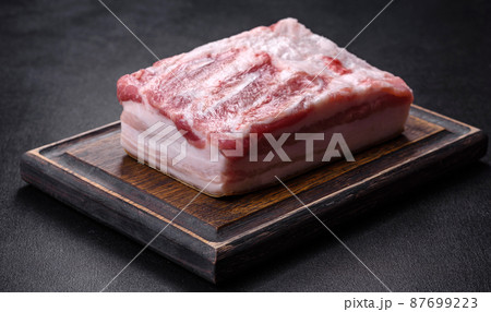 Close-up fat Salted lard homemade lard on a wooden board Close-up fat Salted lard homemade lard on a wooden board 87699223