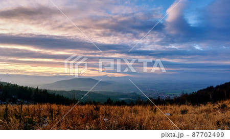 Sunset dramatic sky over mountains shape 87702499
