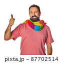 Happy bearded man in stylish white T-shirt with beaming smile showing thumb up. isolated on white background. lgtbq scarf gay concept. good job, well done. agreement concept 87702514