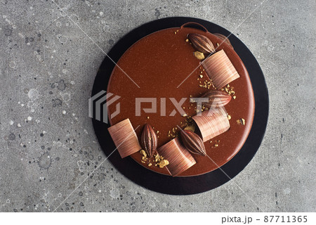 mirror glaze chocolate mousse cake with decoration 87711365