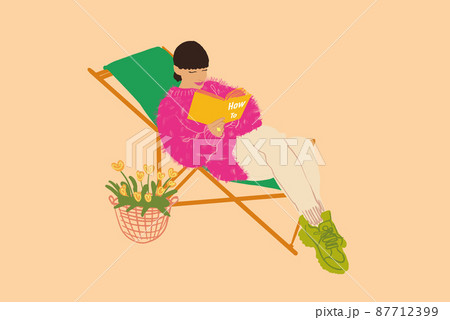 Woman lying on sunbed and reading book with flowers nearby 87712399