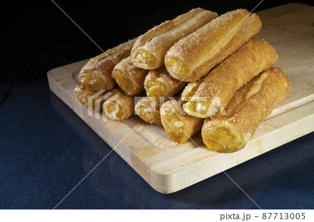 Sweet sticks are with stuffing to rest upon glass table Sweet sticks are with stuffing to rest upon glass table 87713005