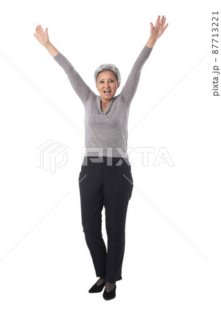 Business woman with raised arms Business woman with raised arms 87713221