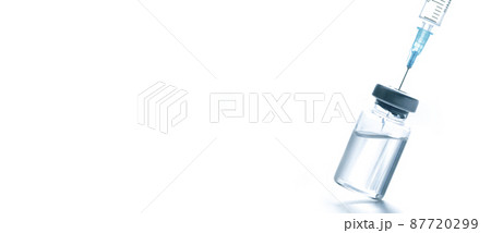 Medical syringe with a needle and a bollte with vaccine. 87720299