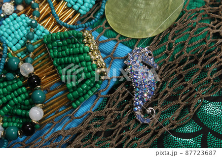 Mermaid Fashion With Jewelry and Fishing Net Close up Mermaid Fashion With Jewelry and Fishing Net Close up 87723687