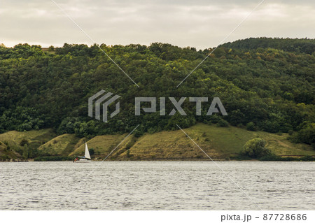 small yacht on Dniester river, Podilski tovtry, Ukraine 87728686