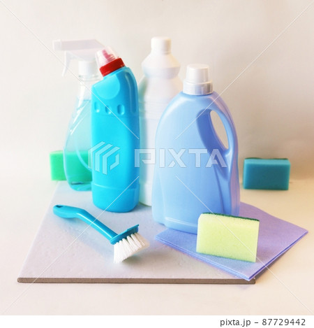 Liquid detergents in plastic bottles, home cleaning products on the table, light background, the concept of cleaning, order, cleanliness, home delivery Liquid detergents in plastic bottles, home cleaning products on the table, light background, the concept of cleaning, order, cleanliness, home delivery 87729442